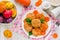 Colorful Easter food background dietary rabbit meat cutlets with