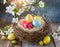 colorful easter nest with easter eggs