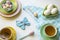 Colorful Easter setting with eggs and thee