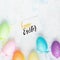 Colorful eater eggs with greeting card. Holiday background