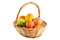 Colorful eggs in wicker basket, painted and festive, isolated - spring tradition