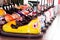 Colorful electric bumper car in autodrom in the fairground attractions at amusement park