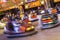 Colorful electric bumper car in the fairground attractions at amusement park.