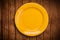 Colorful empty plate on grungy background table