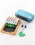 Colorful essential oils and a blue storage case - vertical