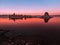 Colorful evening scenery at Mono Lake with tufa columns reflection in the water