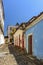 Colorful facades of colonial-style houses on a cobblestone street