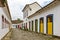 Colorful facades of old colonial-style houses on the cobblestone streets
