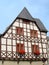 Colorful fachwerk house with geraniums, Eisenach, Germany