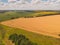 Colorful farm fields from above. Sunflower, wheat, rye and corn