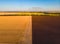 Colorful farm fields from above. Sunflower, wheat, rye and corn