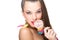 Colorful fashion model with lollipop