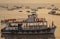 Colorful ferries near the Gateway to India