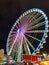 Colorful ferris wheel at night. Amusement park