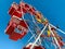 Colorful Ferris wheel with a red carousels