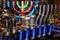 Colorful festive menorah and silver candlesticks on a market in Jerusalem, Israel