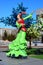 Colorful figure featuring dancing women in Astana