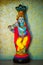 Colorful figure of the Hindu God Krishna playing the flute. Lord Krishna playing the flute.