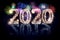 Colorful fireworks display and bright sparkler pyrotechnic number 2020 2019 change happy new year sylvester concept black blue