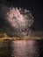 colorful fireworks in the night sky on the seafront of Alicante spain