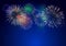 Colorful fireworks vector on dark blue background with sparking bokehs