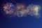 Colorful fireworks vector, sparkling in dark blue sky, fireworks for festive events