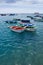 Colorful fisher boats in blue turquoise sea