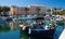 The colorful fishing boat in Ajaccio port, Corsica island.