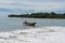 Colorful fishing boat beaching on a sri lankan beach, Arugam bay, Sri lanka