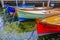 Colorful fishing boats in the habor of Torbole on lake Garda