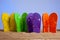 Colorful Flip-Flop Sandles on a Sandy Beach