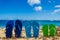 Colorful flip flops on the sandy beach