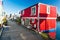 Colorful floating homes in the harbour.Economical living in overcrowded city