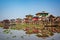 Colorful floating village with stilt-houses on Inle lake in Burma Myanmar