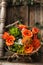 Colorful flower bouquet on a garden bench