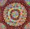 Colorful flower mandala background. Doodle psychedelic tribal backdrop. Vector illustration