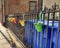 Colorful Flower Pots Hanging on a Fence