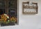 Colorful flowers in an farmhouse window