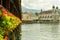 Colorful flowers on wooden bridge in city of Luzern