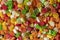 Colorful food macaroni pasta background in market for sale, India, close up