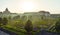 Colorful formal garden at sunset, with a mysterious light