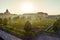 Colorful formal garden at sunset, with a mysterious light