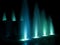 Colorful fountain at night - turquoise Stock Photo