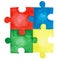 Colorful four jigsaw puzzles of yellow, blue, red and green color isolated on white