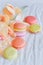 Colorful france macarons on white table background