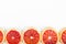 Colorful fresh citrus fruit on white background. Orange, tangerine, lime, blood orange, grapefruit. Fruit background. Summer food