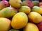 Colorful fresh mangos ready for sale