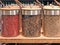 Colorful fresh peppercorns, various spices and colours, close up, jars, stockpot, ingredients