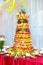 Colorful fruit pyramid on banquet