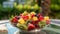 Colorful Fruit Salad on White Plate with Sunny Garden Background